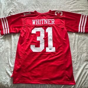 Donte Whitner autographed jersey. Beckett certified